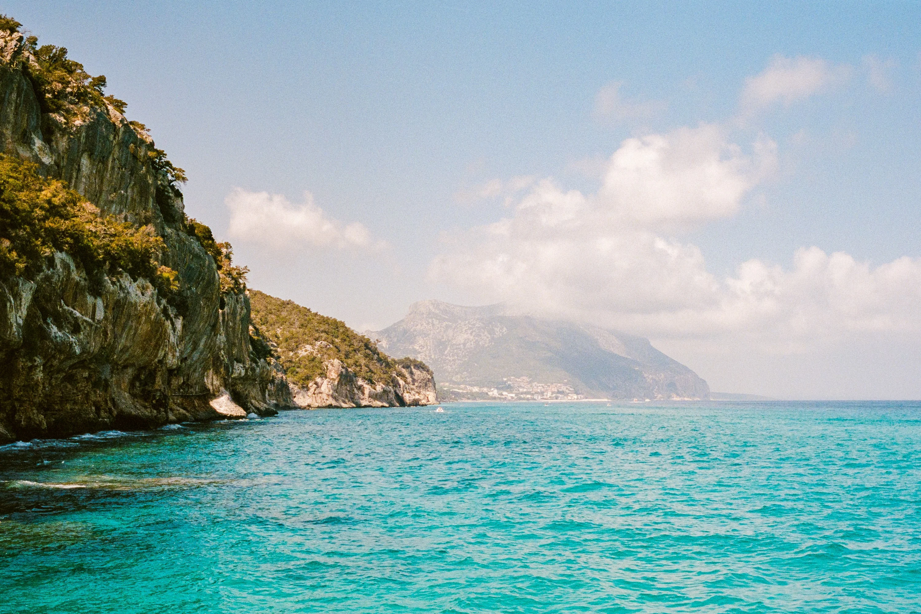 Cliffs dropping into turquoise water