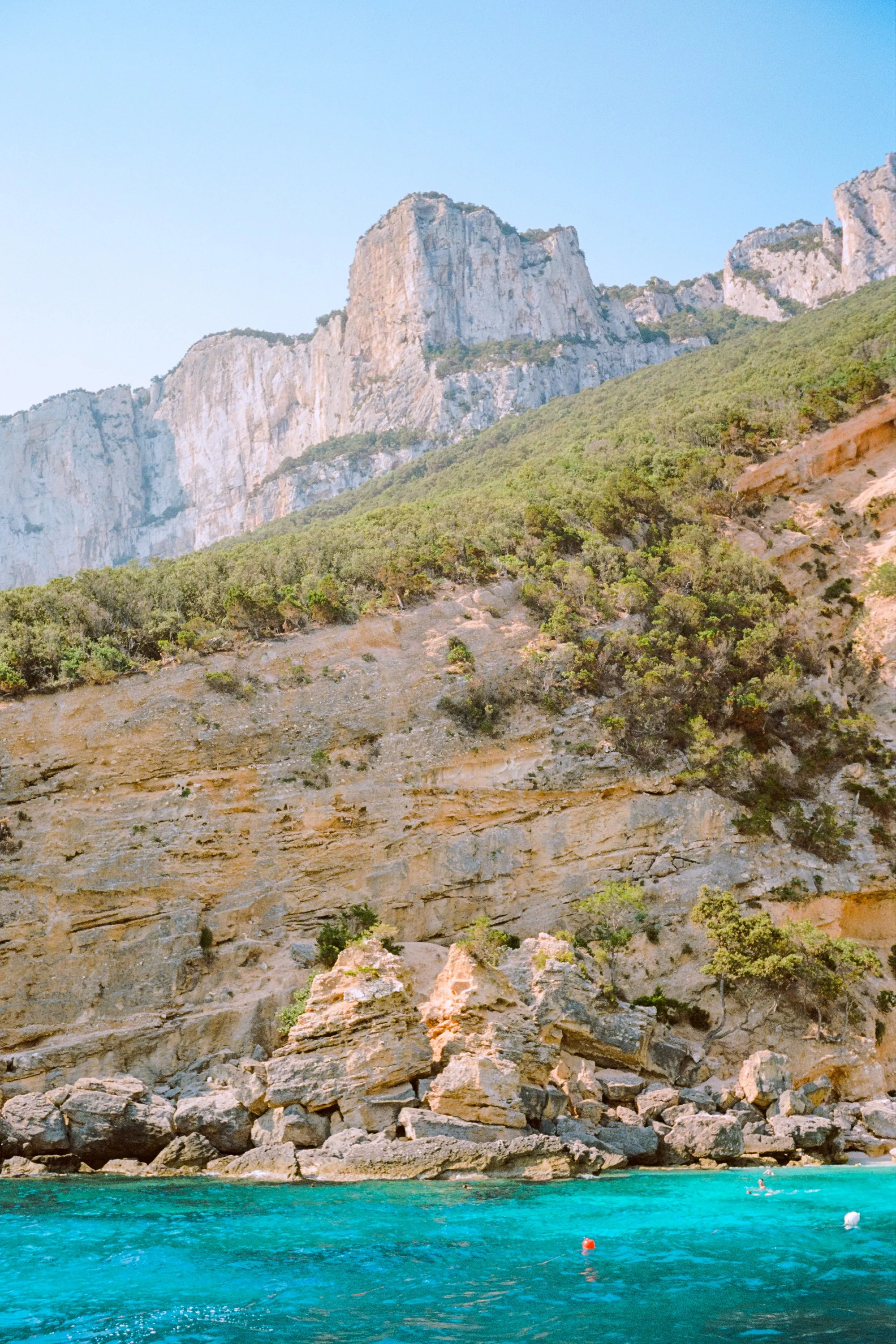 Limestone cliffs above turquoise water