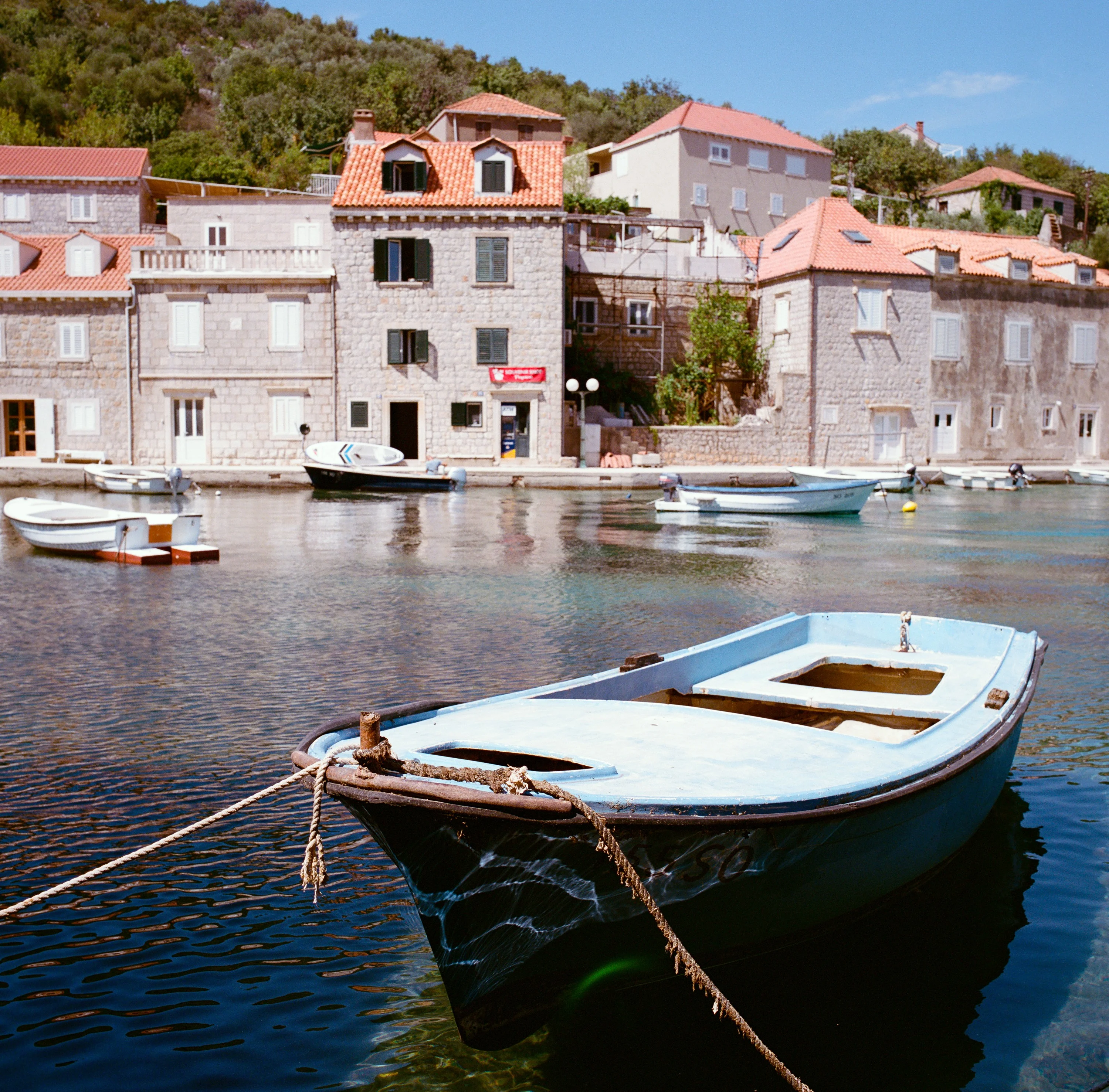 A small boat moored in the old harbour