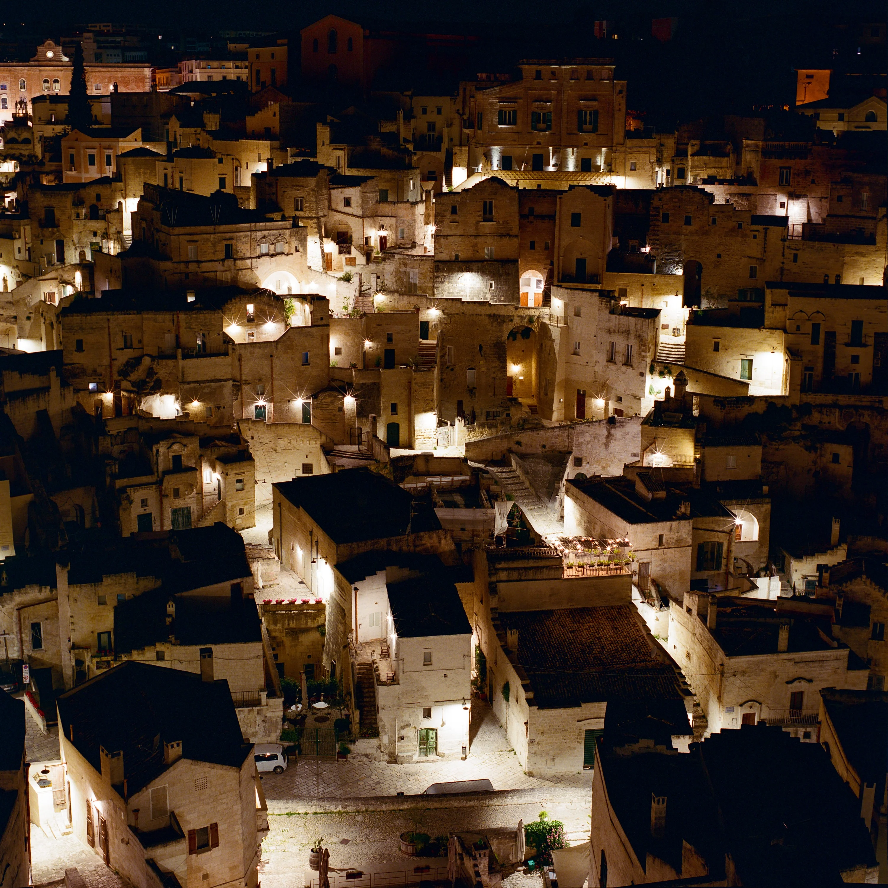 The stone town of Matera lit up at night