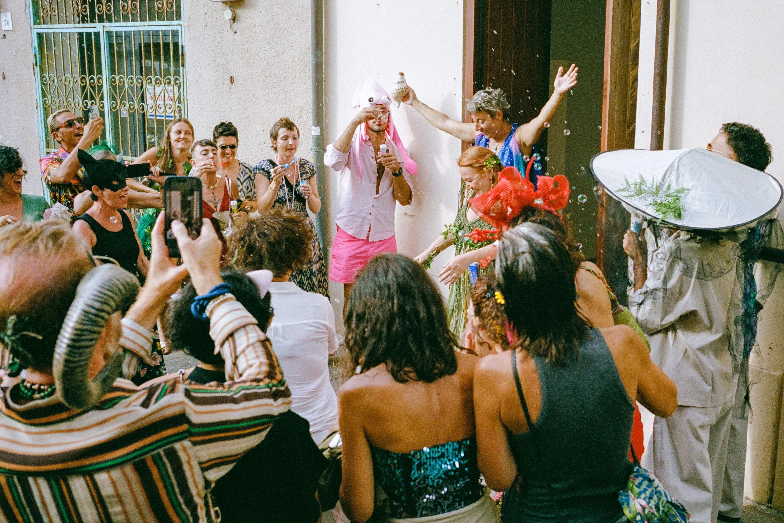 A crowd celebrating in a street